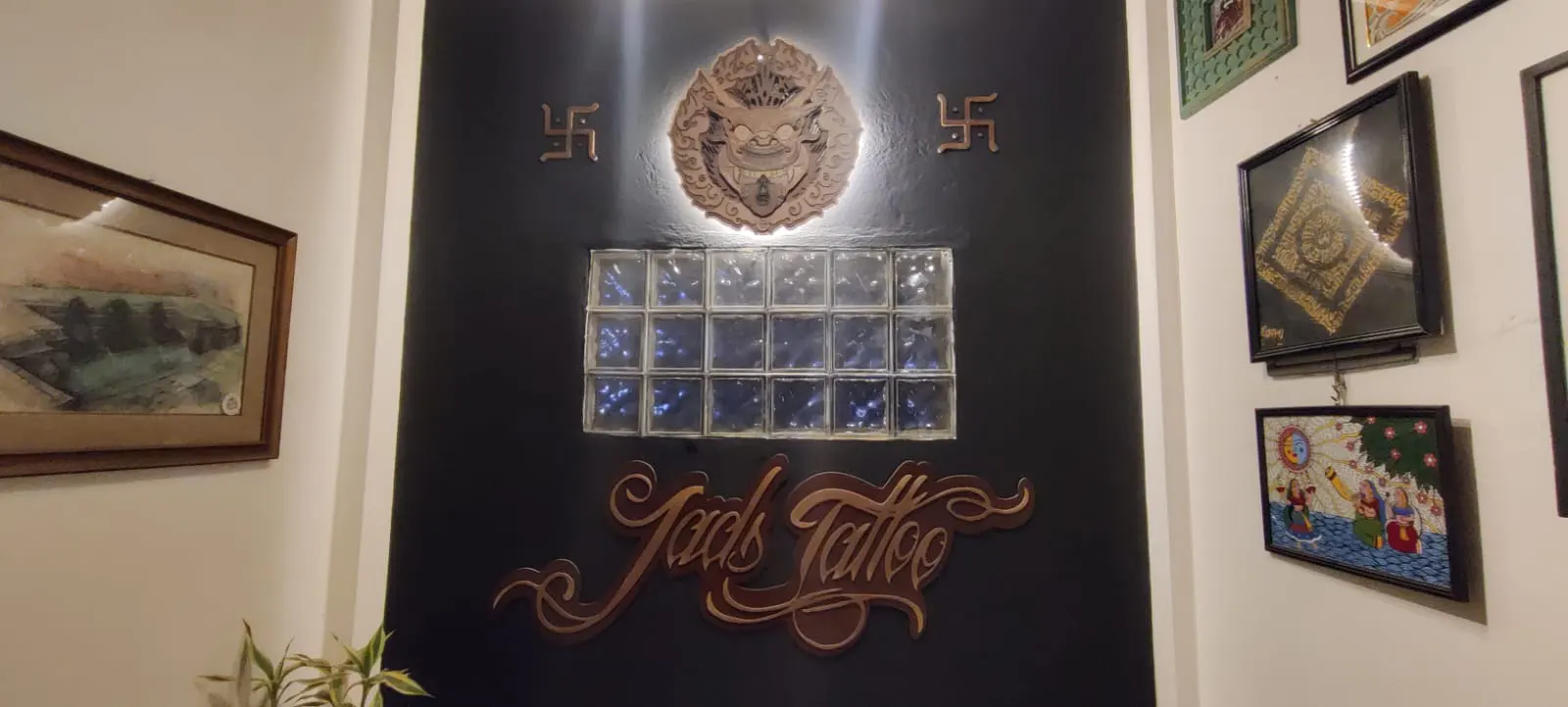 entrance of jads tattoo with signage